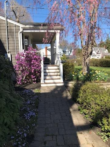 109 Dogwood Ln, Port Jefferson, NY 11777 - view of home's exterior featuring covered porch