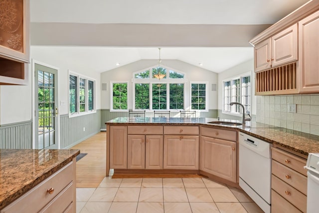 109 Dogwood Ln, Port Jefferson, NY 11777 - kitchen with dishwasher, light brown cabinetry, lofted ceiling, a wainscoted wall, and a peninsula