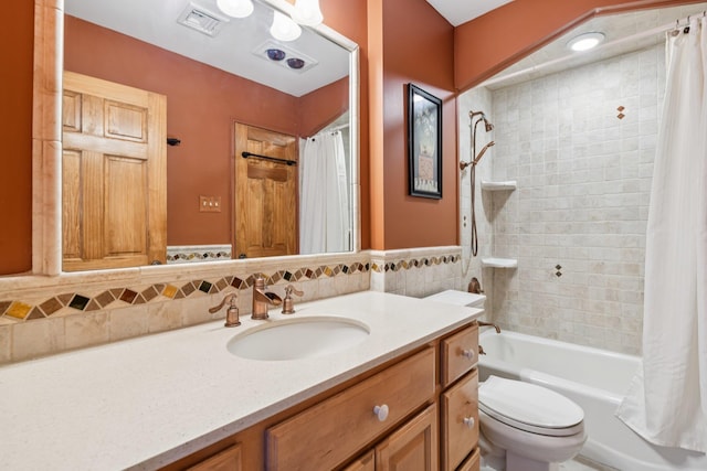 109 Dogwood Ln, Port Jefferson, NY 11777 - bathroom featuring vanity, shower / tub combo with curtain, and tile walls