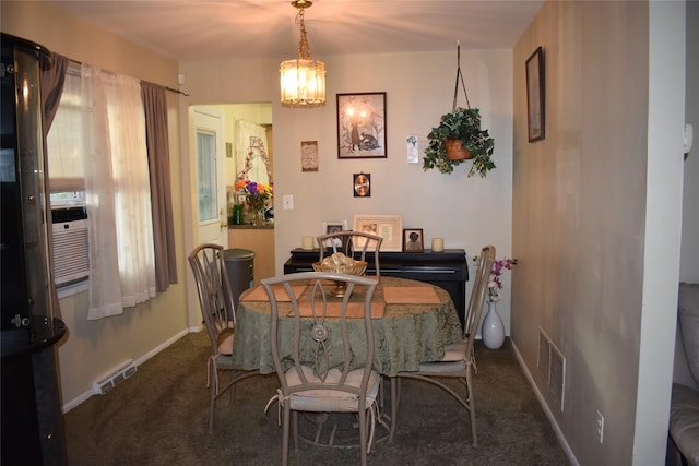 13 W Hickory St, Spring Valley, NY 10977 - dining area featuring carpet flooring and a chandelier