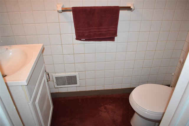 13 W Hickory St, Spring Valley, NY 10977 - bathroom featuring vanity and tile walls