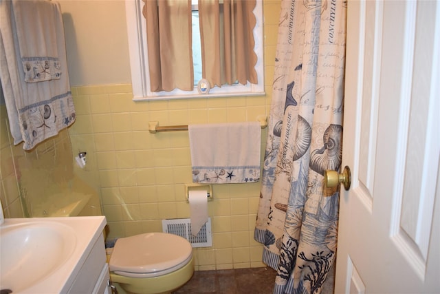 13 W Hickory St, Spring Valley, NY 10977 - bathroom featuring tile walls, vanity, and a shower with shower curtain