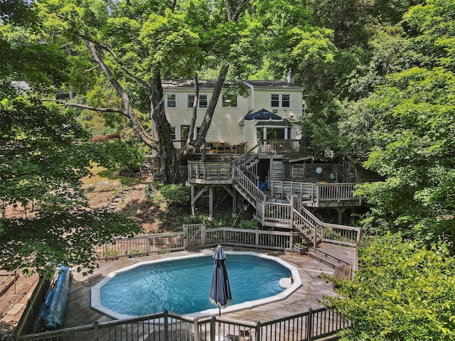3841 Indian Hill Rd, Shrub Oak, NY 10588 - view of pool with a wooden deck and stairway