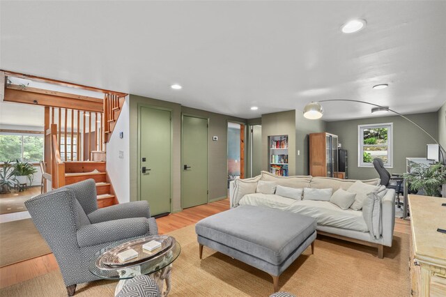 3841 Indian Hill Rd, Shrub Oak, NY 10588 - living room featuring light wood-style floors, stairway, and recessed lighting