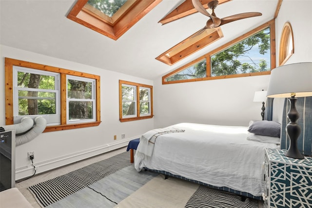 3841 Indian Hill Rd, Shrub Oak, NY 10588 - bedroom featuring a skylight, vaulted ceiling, baseboard heating, and wood finished floors