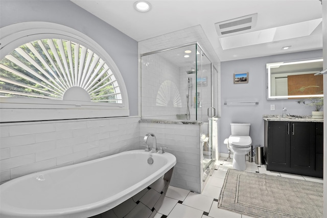 3841 Indian Hill Rd, Shrub Oak, NY 10588 - bathroom featuring vanity, a shower stall, a freestanding tub, recessed lighting, and tile patterned flooring