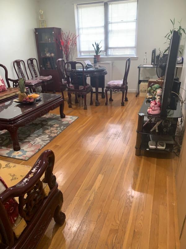 13539 78th Ave Unit 23B, Flushing, NY 11367 - living room featuring light wood-style floors
