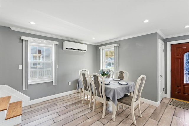 26 Fieldmere St, Elmont, NY 11003 - dining area with light wood-style floors, crown molding, recessed lighting, and a wall mounted air conditioner