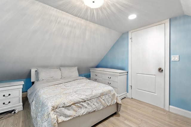 26 Fieldmere St, Elmont, NY 11003 - bedroom featuring light wood-style floors, lofted ceiling, and recessed lighting