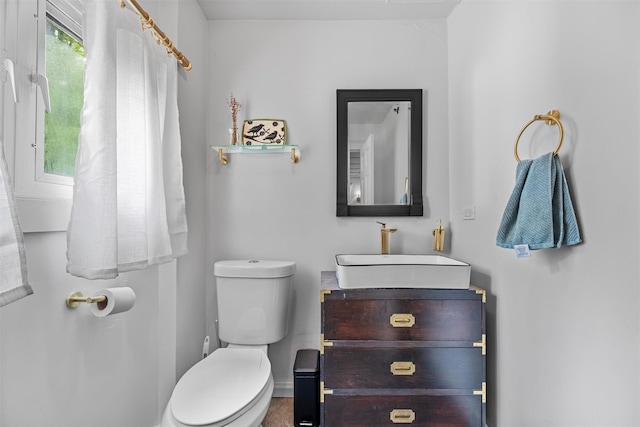 1302 Rte 22 Unit 1300, Brewster, NY 10509 - bathroom featuring vanity, toilet, and baseboards
