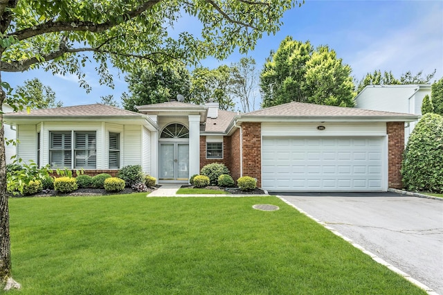 165 Country Club Dr, Commack, NY 11725 - ranch-style home with brick siding, french doors, asphalt driveway, a front lawn, and an attached garage