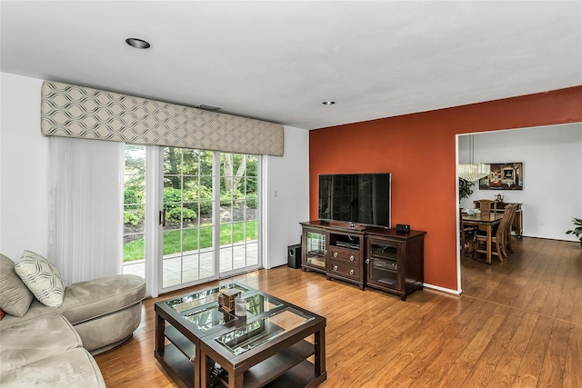 165 Country Club Dr, Commack, NY 11725 - living area with wood finished floors and recessed lighting
