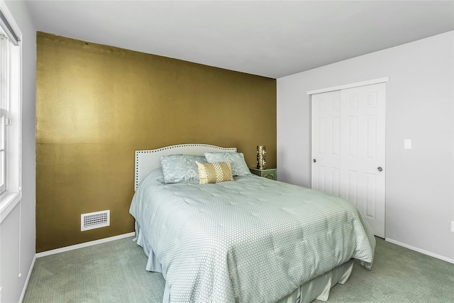 165 Country Club Dr, Commack, NY 11725 - carpeted bedroom with a closet and baseboards