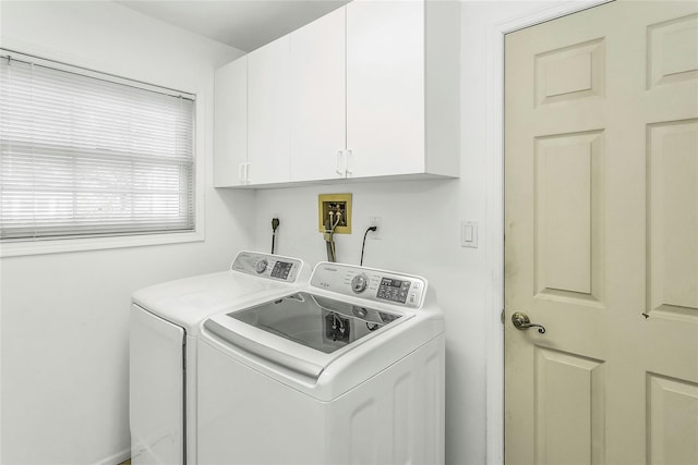165 Country Club Dr, Commack, NY 11725 - laundry area featuring washer and dryer and cabinet space