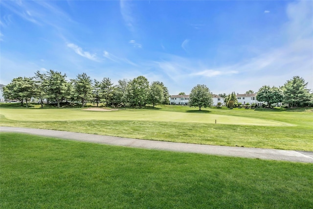 165 Country Club Dr, Commack, NY 11725 - surrounding community with a yard and golf course view