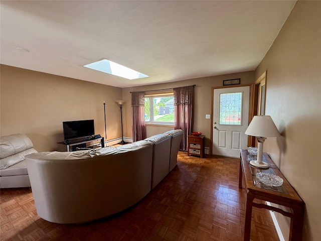 17 Wilson Rd, Brewster, NY 10509 - living room featuring a skylight and a baseboard radiator