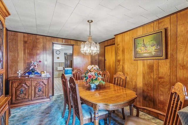 10364 52nd Ave, Flushing, NY 11368 - carpeted dining space featuring a chandelier and wooden walls