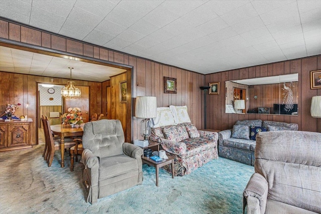 10364 52nd Ave, Flushing, NY 11368 - living area with carpet floors, wooden walls, and a chandelier