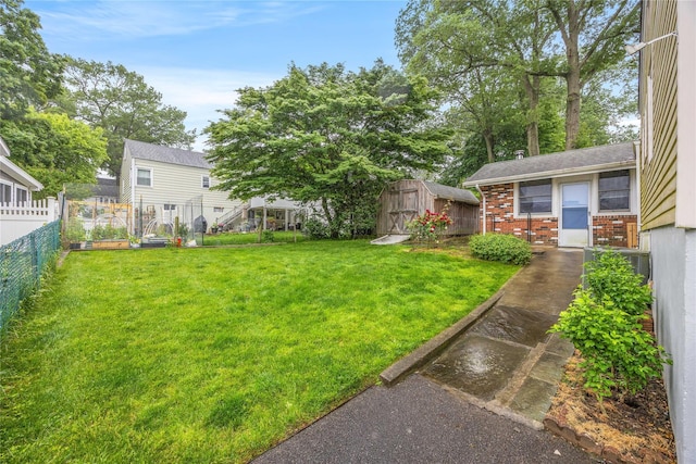 1400 Raleigh Rd, Mamaroneck, NY 10543 - view of yard with a storage unit