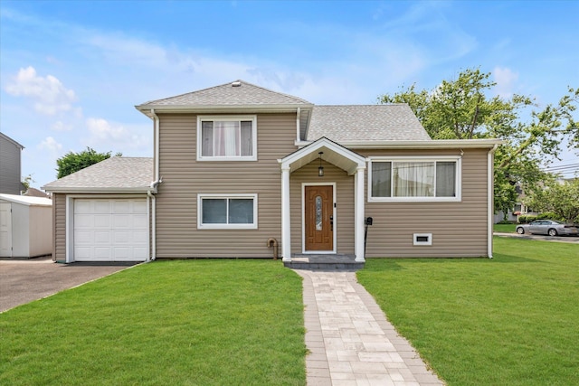 2716 Beach Dr, Merrick, NY 11566 - view of front of home featuring an attached garage, a front lawn, a shingled roof, and asphalt driveway
