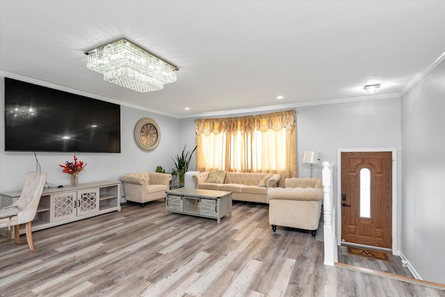 2716 Beach Dr, Merrick, NY 11566 - living room featuring a chandelier, wood finished floors, ornamental molding, baseboards, and recessed lighting