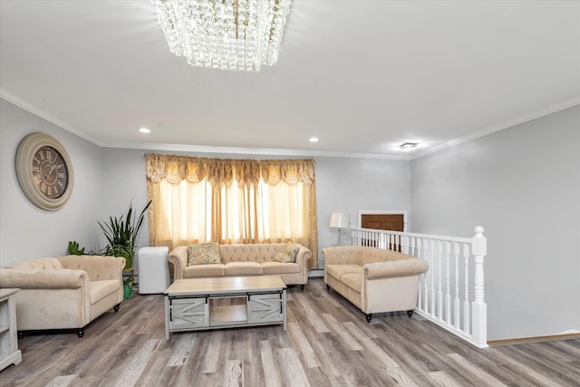 2716 Beach Dr, Merrick, NY 11566 - living area featuring a chandelier, wood finished floors, crown molding, recessed lighting, and baseboard heating