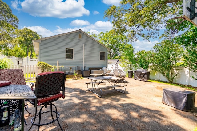 85 Ferndale Ave, Selden, NY 11784 - fenced backyard with outdoor dining area, a patio area, and area for grilling