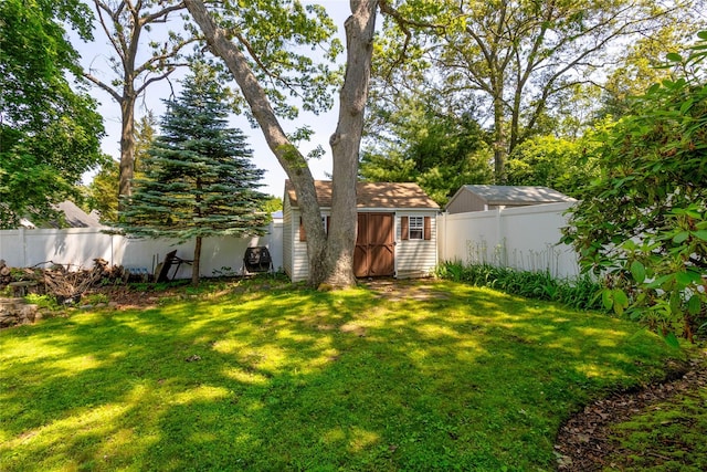 85 Ferndale Ave, Selden, NY 11784 - fenced backyard with a storage unit