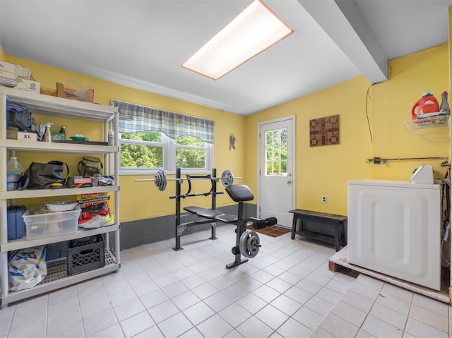 15 Tennyson Dr, Nanuet, NY 10954 - workout area with washer / dryer and light tile patterned floors