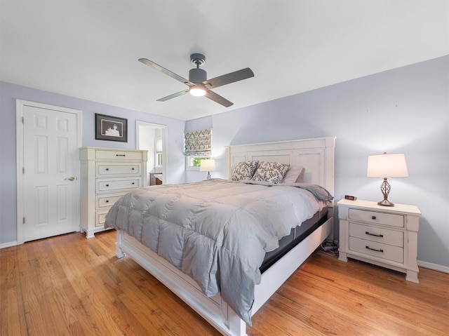 15 Tennyson Dr, Nanuet, NY 10954 - bedroom featuring light wood-style flooring, baseboards, connected bathroom, and a ceiling fan