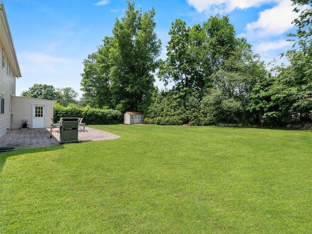 15 Tennyson Dr, Nanuet, NY 10954 - view of grassy yard featuring a patio