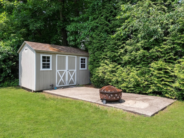 15 Tennyson Dr, Nanuet, NY 10954 - view of shed with an outdoor fire pit