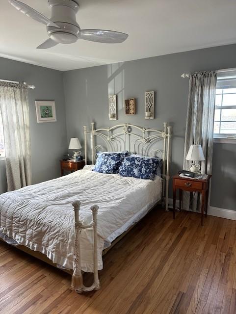 81 Brunswick Rd, Ronkonkoma, NY 11779 - bedroom featuring wood finished floors and a ceiling fan