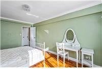 63-95 Austin St Unit 2F, Rego Park, NY 11374 - bedroom with baseboards