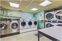63-95 Austin St Unit 2F, Rego Park, NY 11374 - community laundry featuring washer and dryer and stacked washing machine and dryer