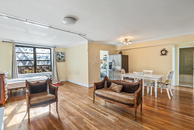 63-95 Austin St Unit 2F, Rego Park, NY 11374 - living room with wood finished floors and ornamental molding