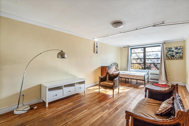 63-95 Austin St Unit 2F, Rego Park, NY 11374 - sitting room featuring crown molding and hardwood / wood-style floors