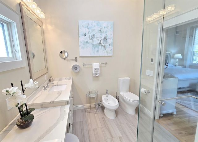 12 Sound View Dr, Rocky Point, NY 11778 - bathroom featuring a bidet, healthy amount of natural light, and vanity