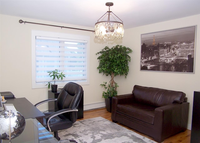 12 Sound View Dr, Rocky Point, NY 11778 - office space with wood finished floors, a chandelier, and a baseboard heating unit