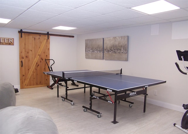 12 Sound View Dr, Rocky Point, NY 11778 - recreation room with a barn door and a paneled ceiling