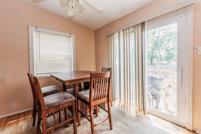 72 Parkway Blvd, Ronkonkoma, NY 11779 - dining room with light wood-style flooring and a ceiling fan