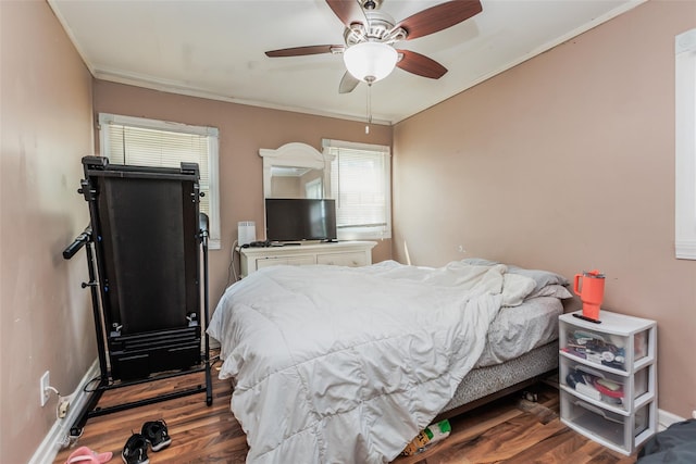 72 Parkway Blvd, Ronkonkoma, NY 11779 - bedroom featuring wood finished floors, ornamental molding, and ceiling fan