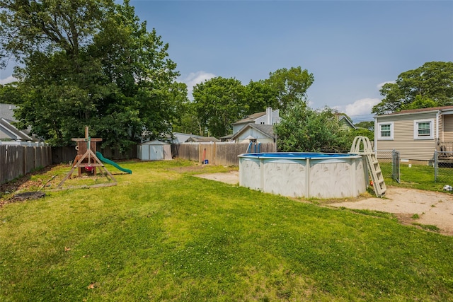 72 Parkway Blvd, Ronkonkoma, NY 11779 - fenced backyard with a storage unit