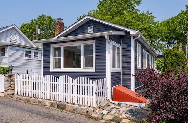 6 Beech Pl Unit 6, Bronx, NY 10465 - view of home's exterior featuring a chimney