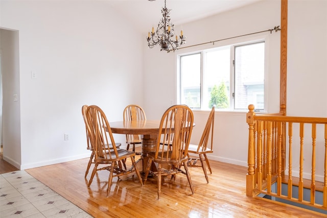 6 Beech Pl Unit 6, Bronx, NY 10465 - dining area with a chandelier, light wood-style flooring, baseboards, and vaulted ceiling