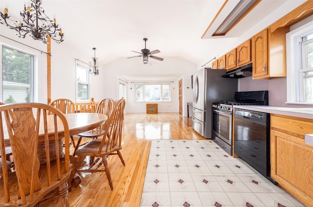6 Beech Pl Unit 6, Bronx, NY 10465 - kitchen with appliances with stainless steel finishes, light wood-style floors, under cabinet range hood, ceiling fan, and vaulted ceiling