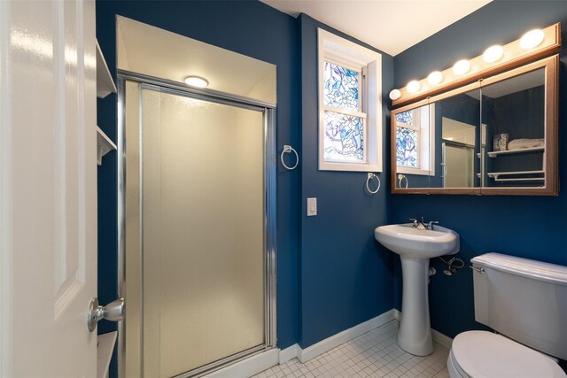 6 Beech Pl Unit 6, Bronx, NY 10465 - full bath featuring a stall shower, toilet, tile patterned floors, and baseboards