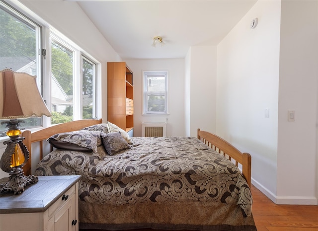 6 Beech Pl Unit 6, Bronx, NY 10465 - bedroom featuring light wood-style flooring, multiple windows, and baseboards