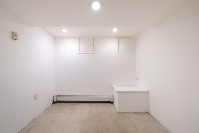 6 Beech Pl Unit 6, Bronx, NY 10465 - finished basement featuring a baseboard heating unit and recessed lighting