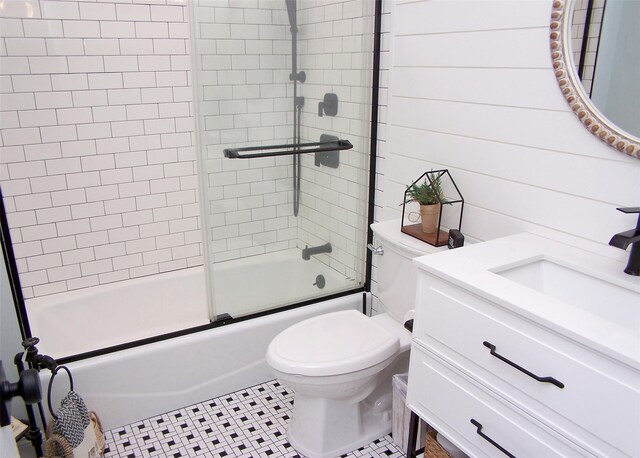 53 Admiral St, Port Jefferson Station, NY 11776 - full bathroom featuring toilet, shower / bath combination with glass door, and vanity